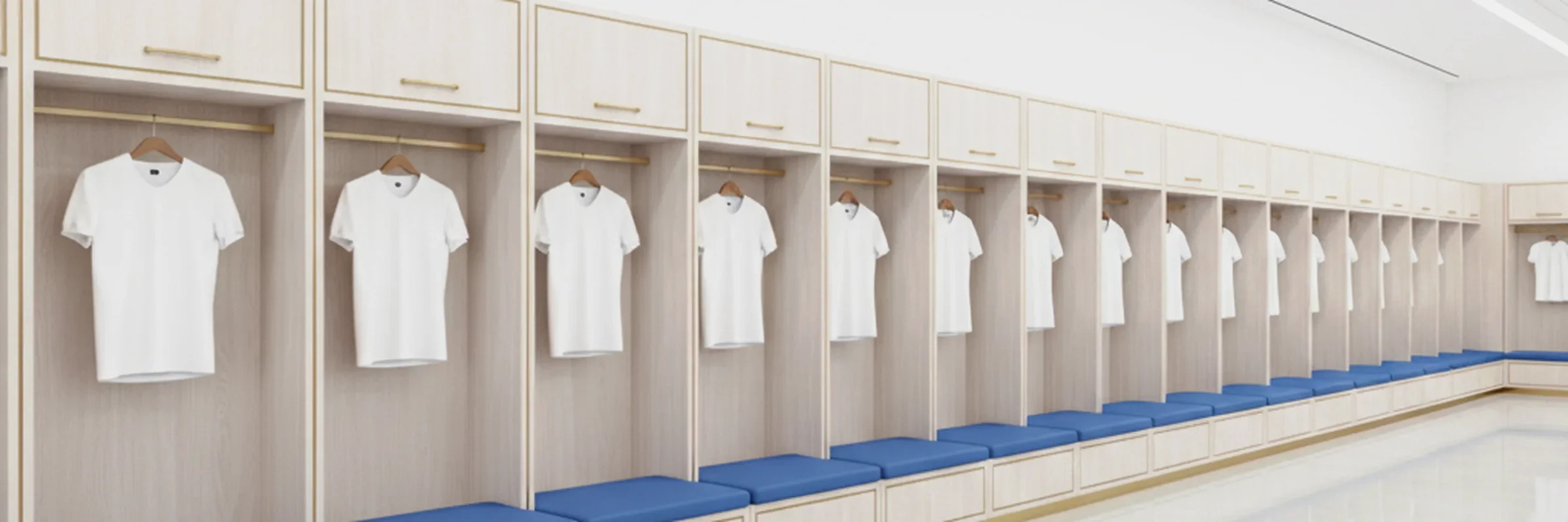 Bright clean dressing room with white jerseys hanging in lockers